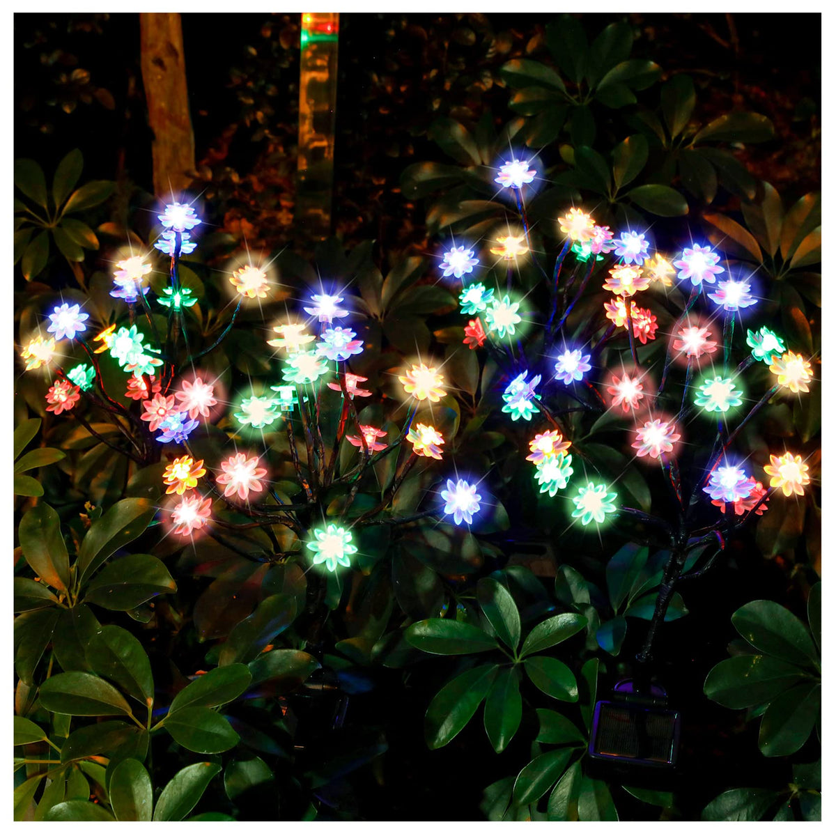 TONULAX solar garden lights with assembled flowers brighten walkways for evening gatherings.