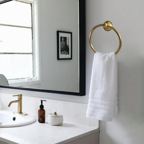 Detailed view of TooCust antique brass towel bar showing smooth edges