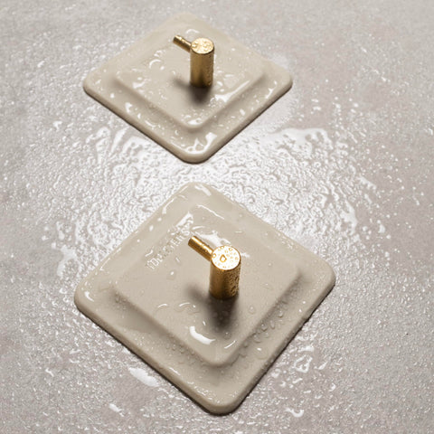 TOOLETRIES Arnold hook is removable and reusable for on-the-go use