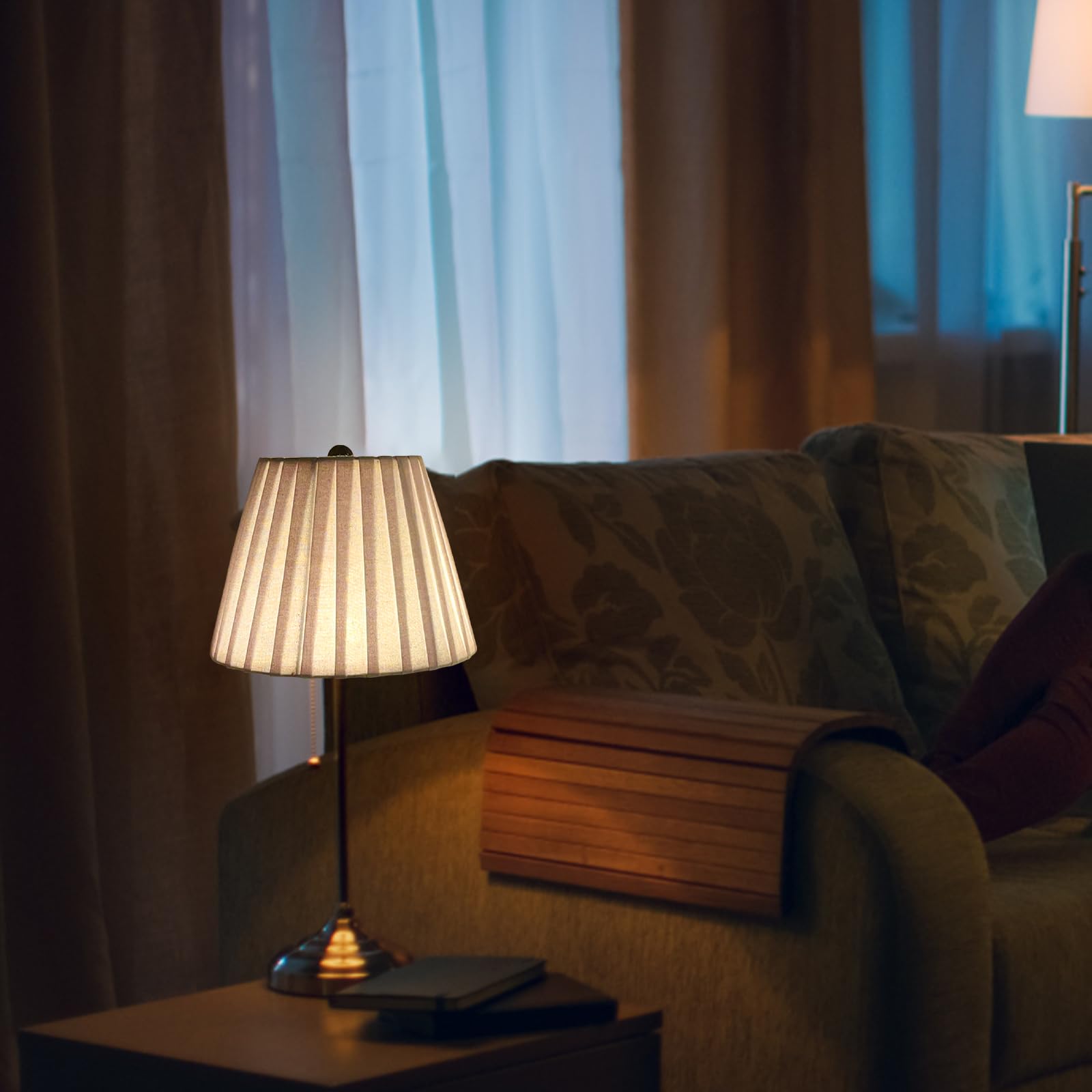 TOOTOO STAR diffused light through pleated white linen shade.