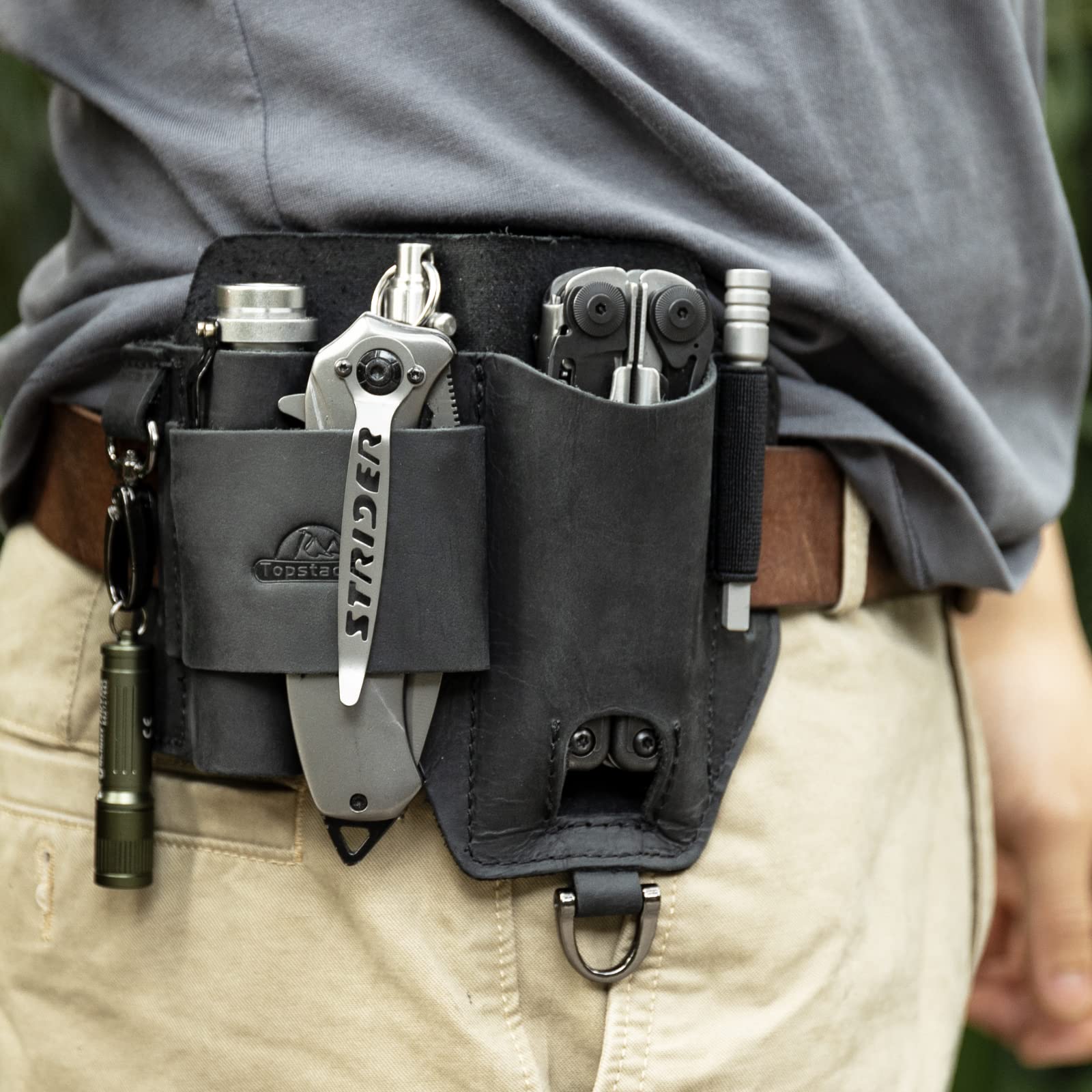 Topstache sheath belt-loop detail for secure daily wear.