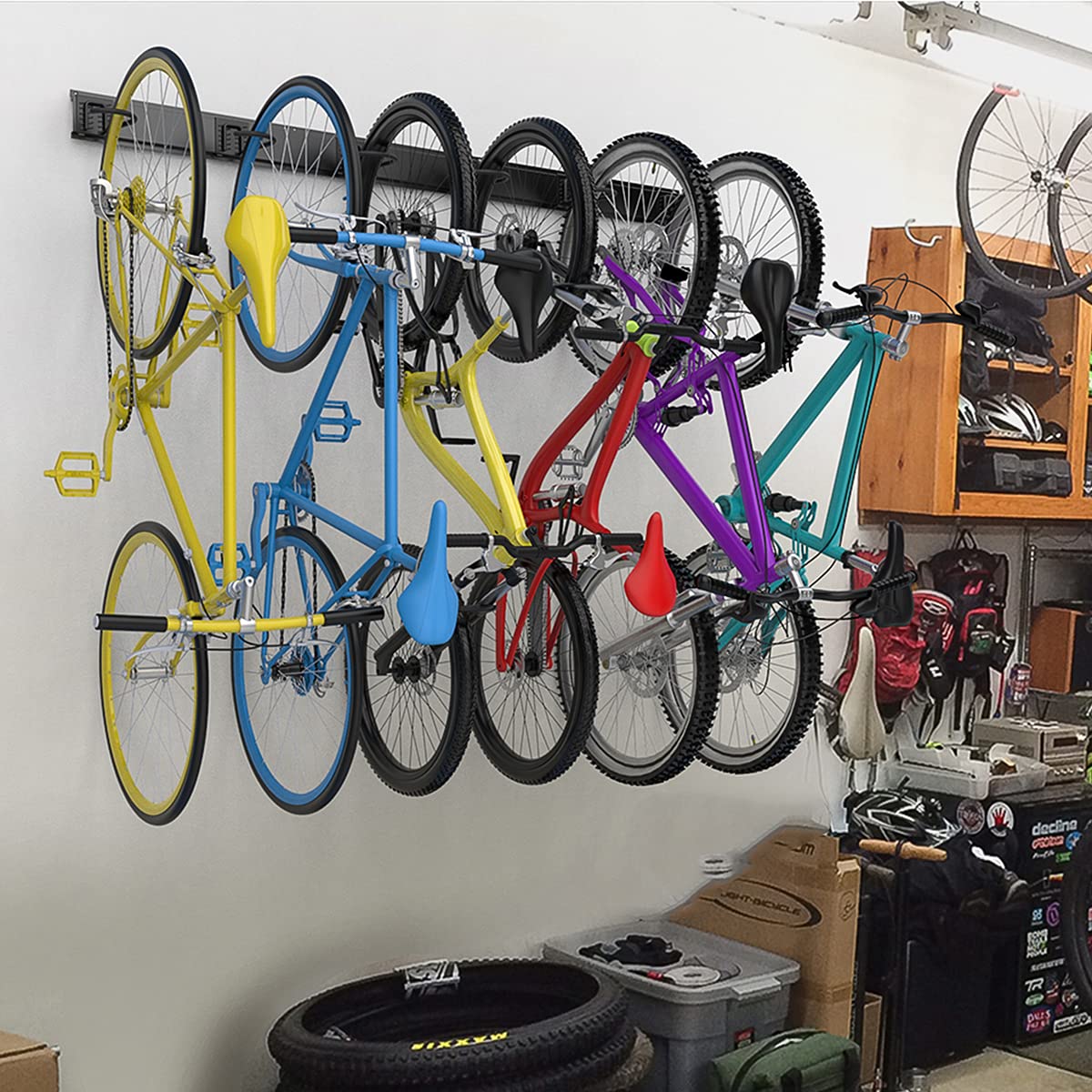 TORACK rubber-coated sleeves protect bikes and walls during mounting.