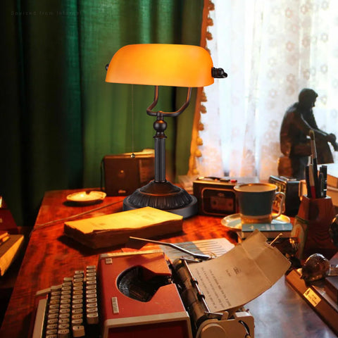 TORCHSTAR Bankers Desk Lamp bronze base adds sturdy vintage presence to your desk.