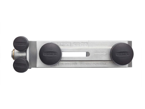 Tormek SE-77 safety stops secure tools on universal support during grinding.