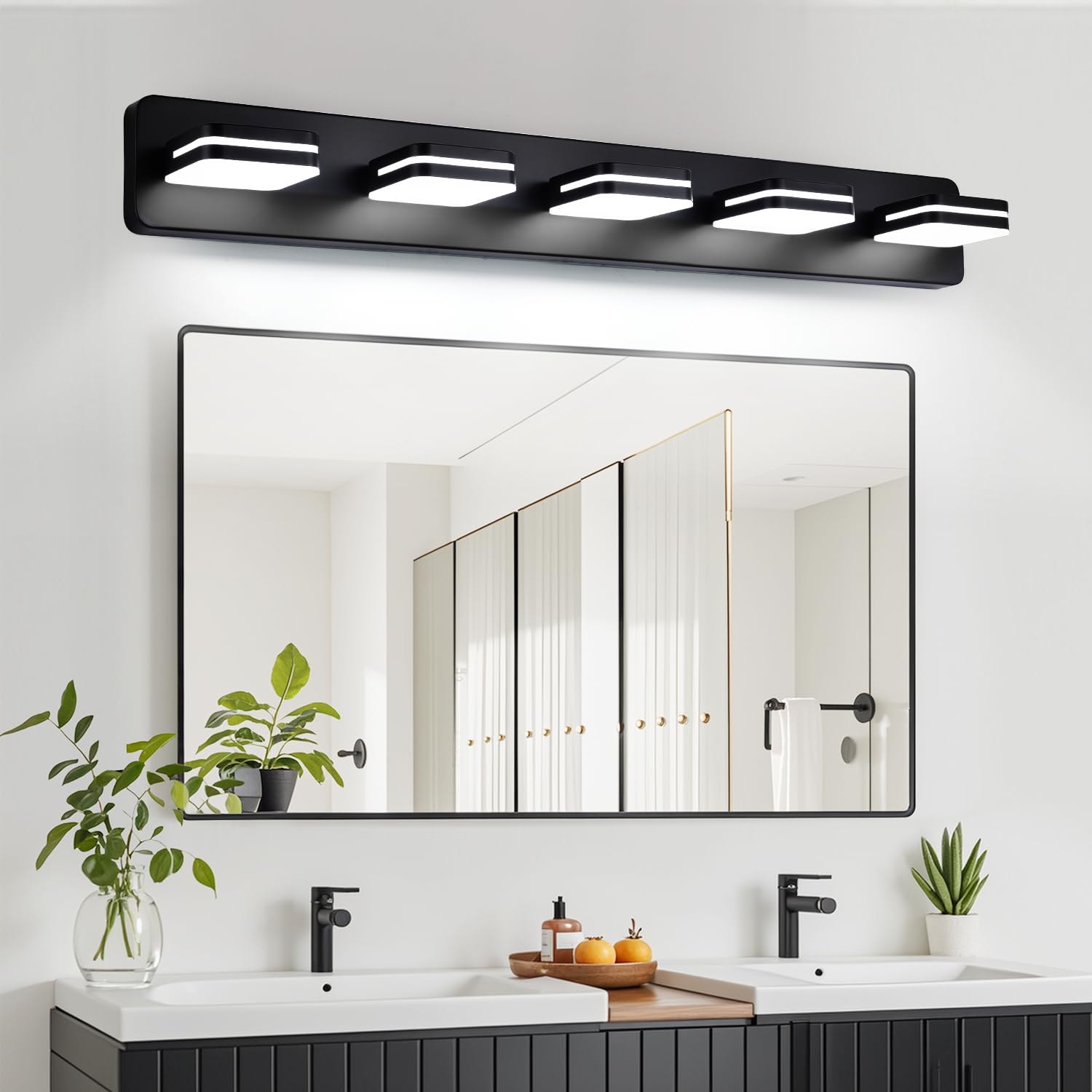 Torondo above-mirror fixture creates even illumination across your reflection.
