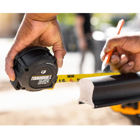 ToughBuilt ProBlade tape measure ergonomic grip reducing hand fatigue.
