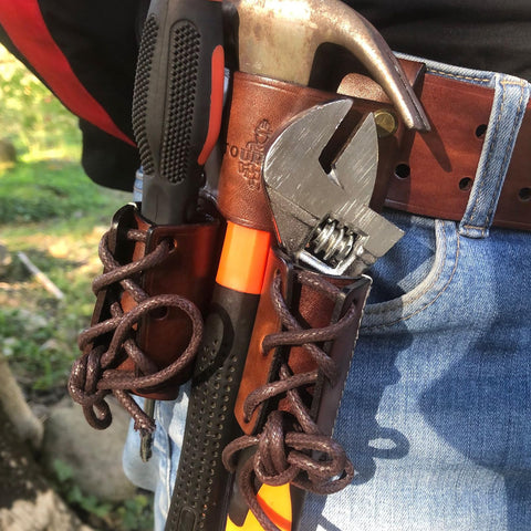 Tourbon harness leather construction with tunnel loop and rivet reinforcement.