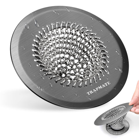 TRAPMATE shower hair drain catcher installed on a drain to prevent clogs