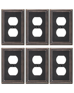 TREEWELL 6-pack duplex outlet cover aged bronze enhances room decor and durability.