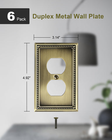 TREEWELL antique brass wall plate with pearl border adds subtle elegance.