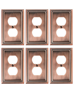 Treewell duplex outlet cover in antique copper with pearl border, elevating traditional decor.