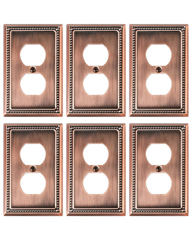 Treewell duplex outlet cover in antique copper with pearl border, elevating traditional decor.