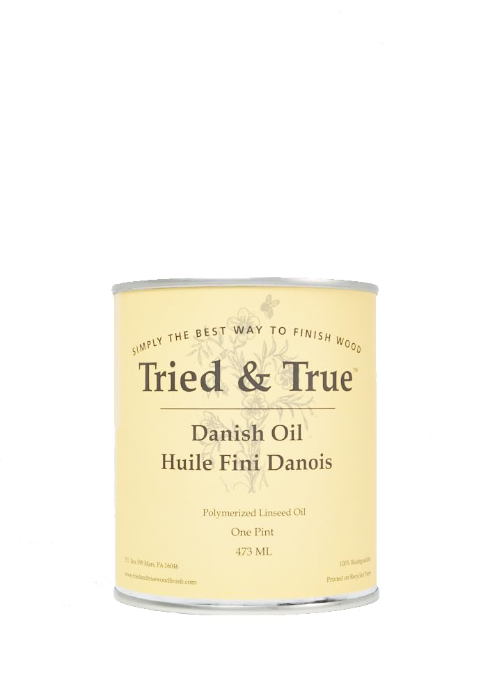 Tried & True Danish Oil bottle pour demonstrates rapid penetration for wood.