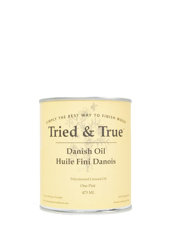 Tried & True Danish Oil bottle pour demonstrates rapid penetration for wood.