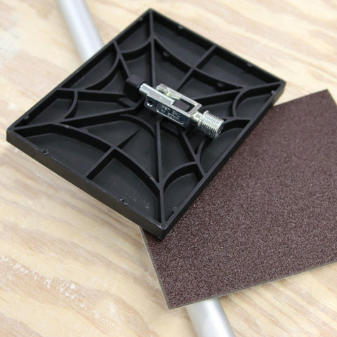 Ergonomic grip on the Black Widow Pro sander head for comfortable use.