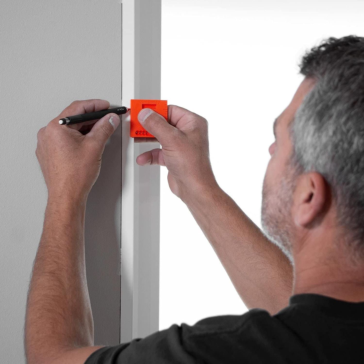 Trim Buddy usage during door and window trim installation.