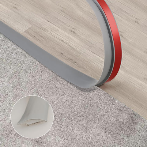 Trimold carpet-to-tile threshold in grey enables seamless transitions in high-traffic areas