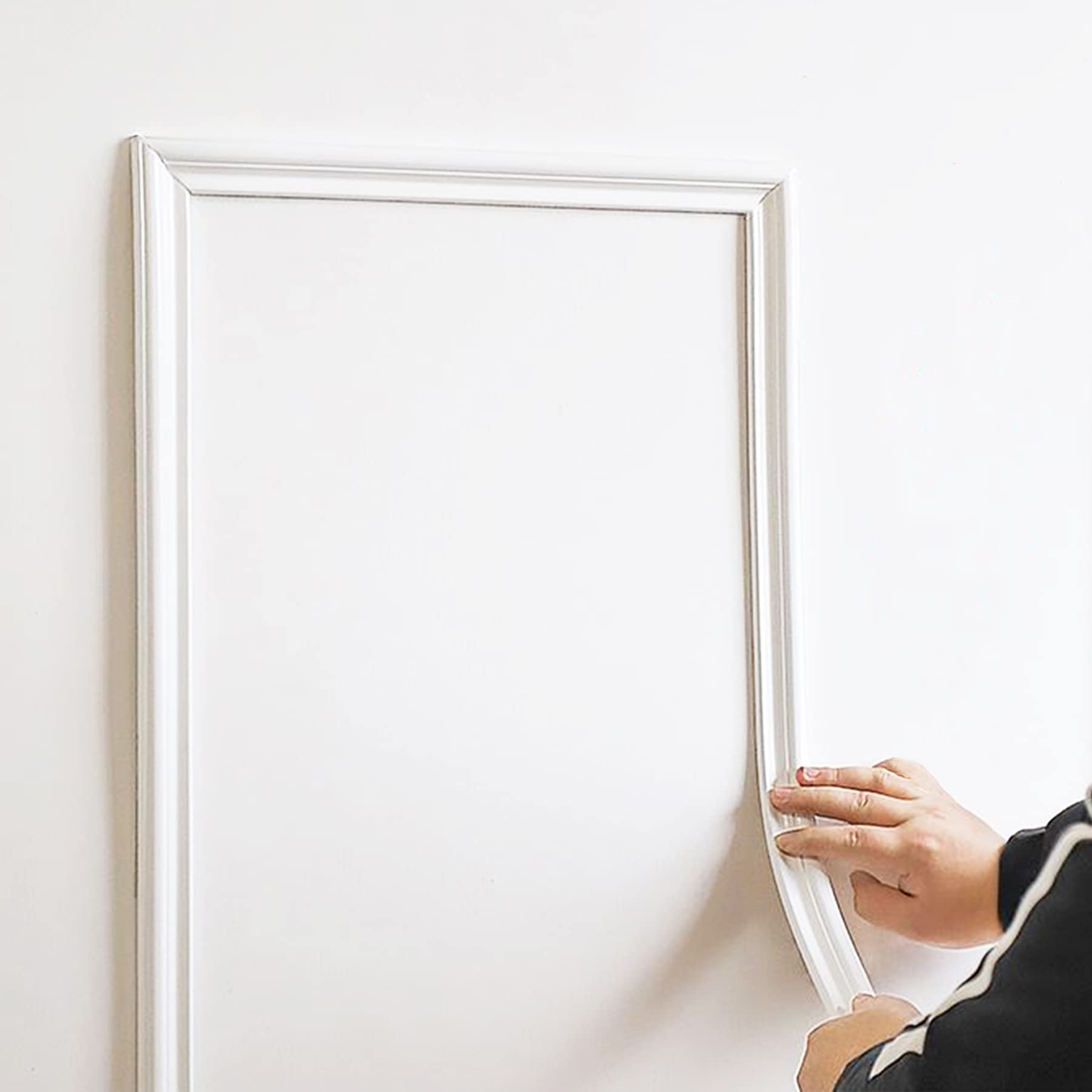 Trimold peel and stick chair rail on wall adds vibrant color and surface protection.