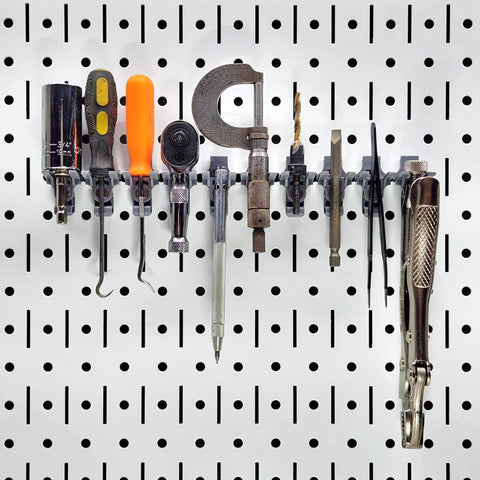 TROPEK bracket with lever release enables easy tool removal.