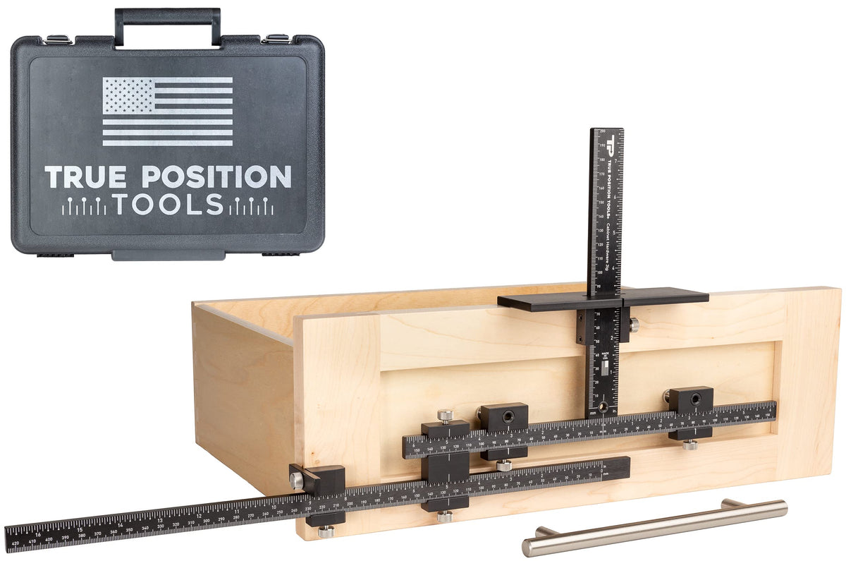 True Position Tools PRO cabinet jig centers drawer fronts for precise hardware placement.