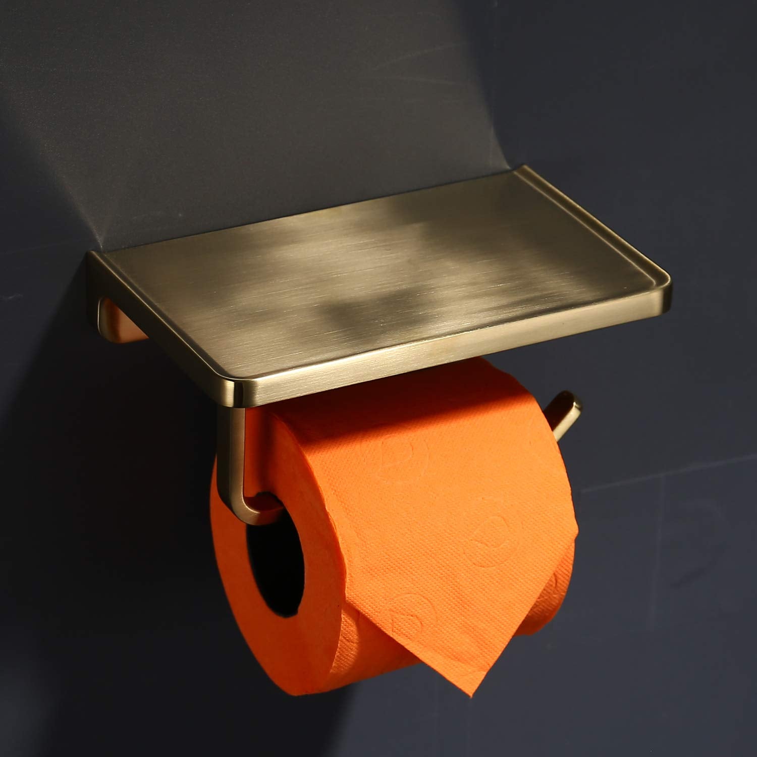 Trustmi wall-mounted brushed gold holder assembly view, sturdy zinc alloy build.