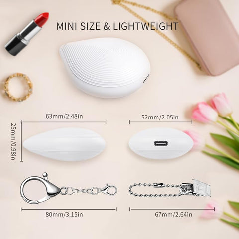 Tubasion portable purse light hangs or clips on travel gear