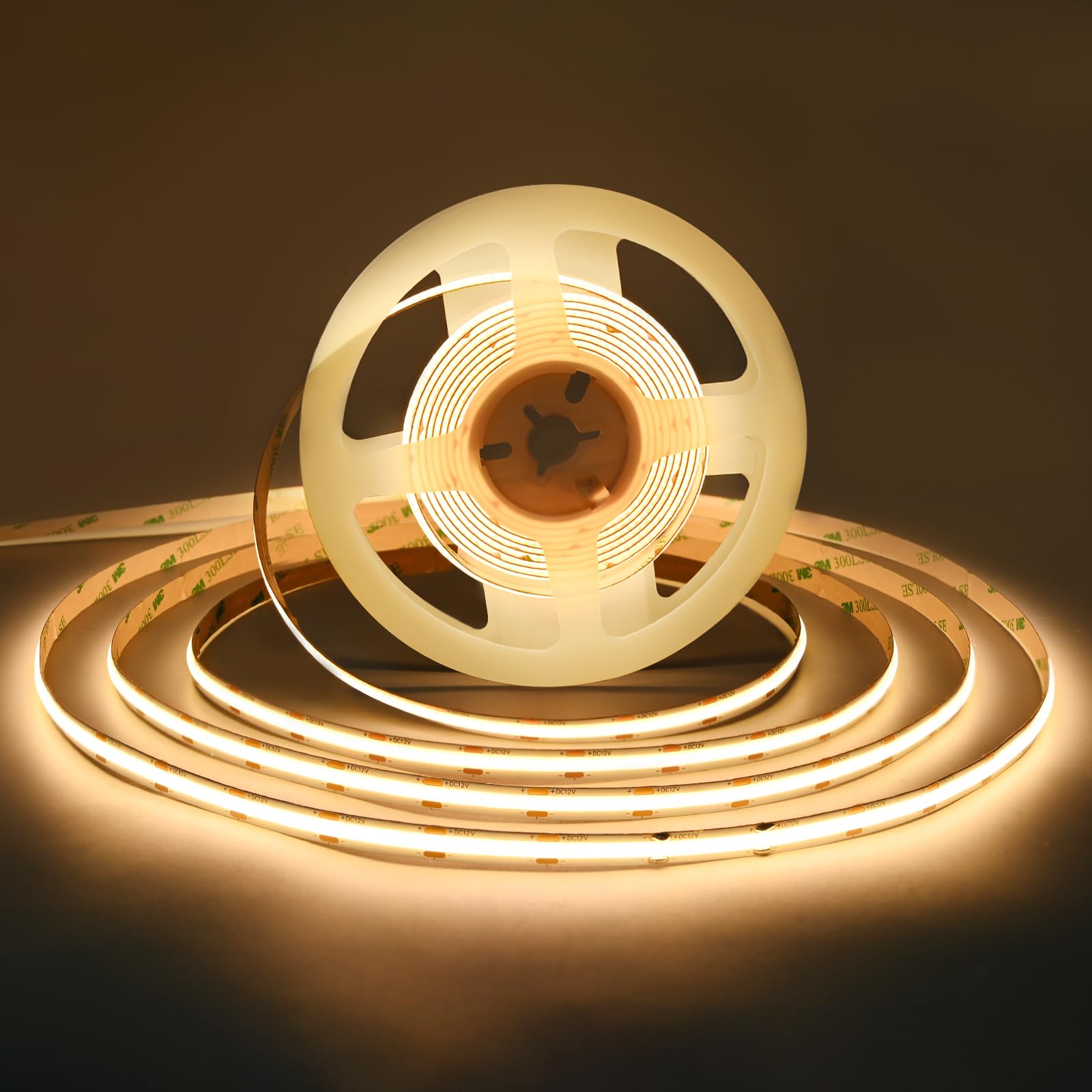 TUNICHX COB LED strip emits a warm white glow across a living room wall for cozy ambiance