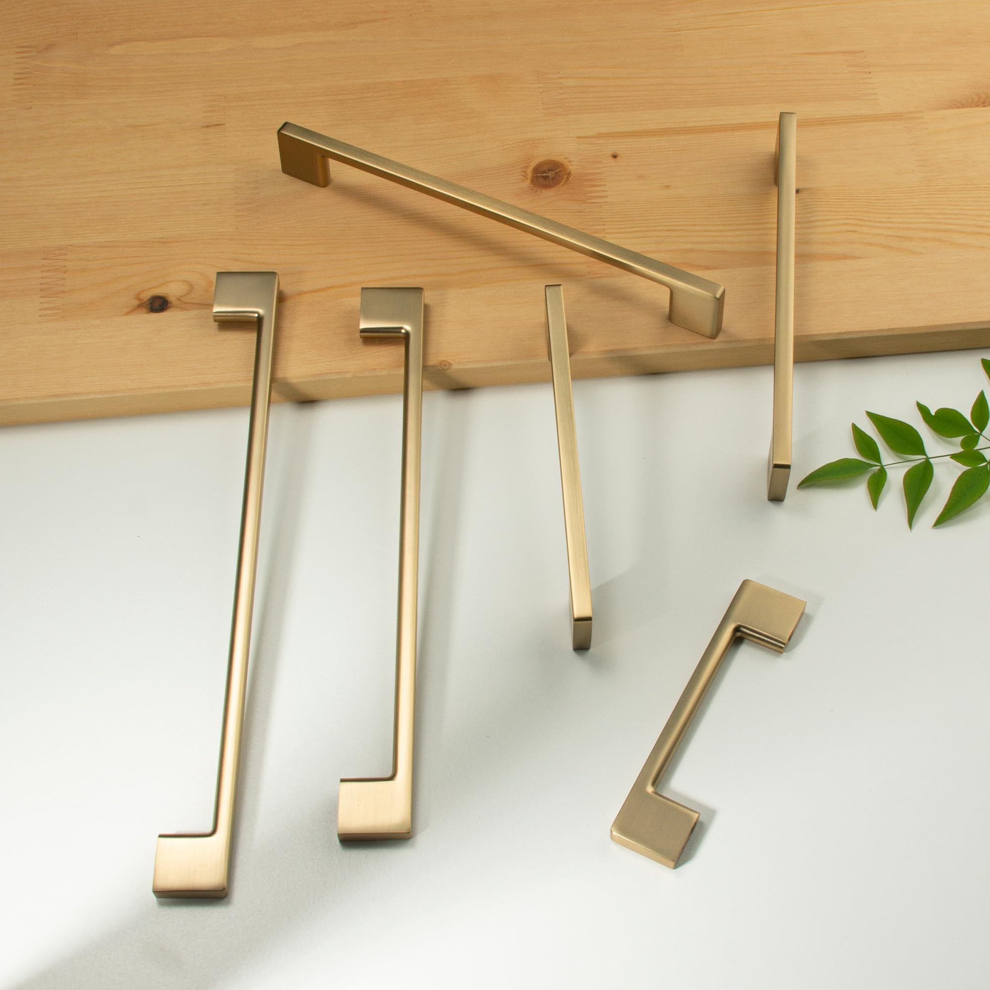 TUNNY champagne bronze cabinet handle installed on a cabinet door enhances style and function.