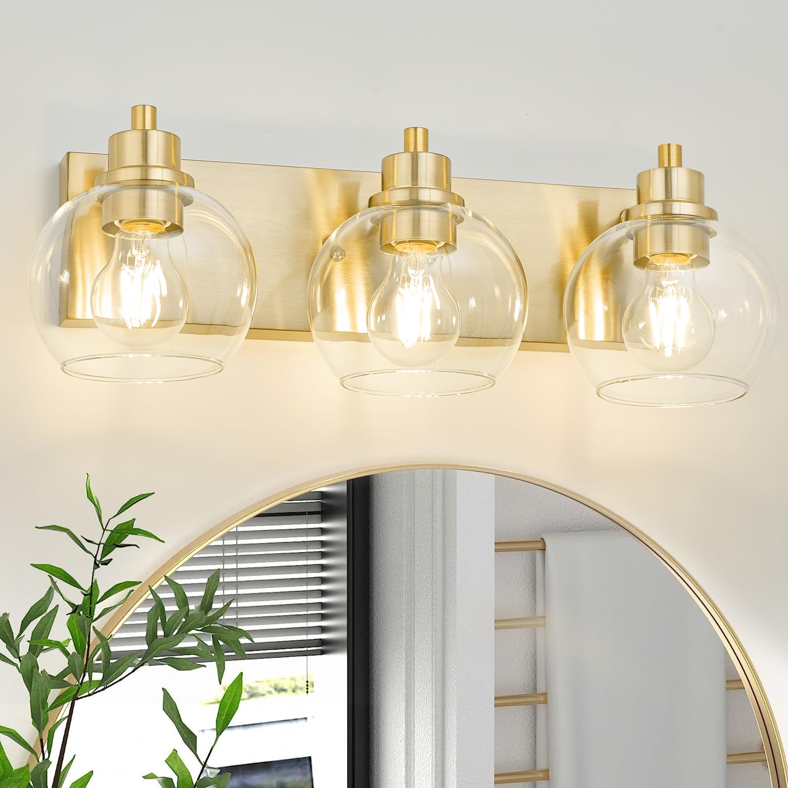 Tuscarora brushed gold vanity fixture close-up, durable metal finish.