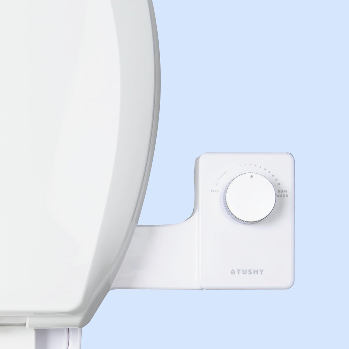 TUSHY Fresh Cool Water Bidet seat close-up with refreshing spray for cleanliness.