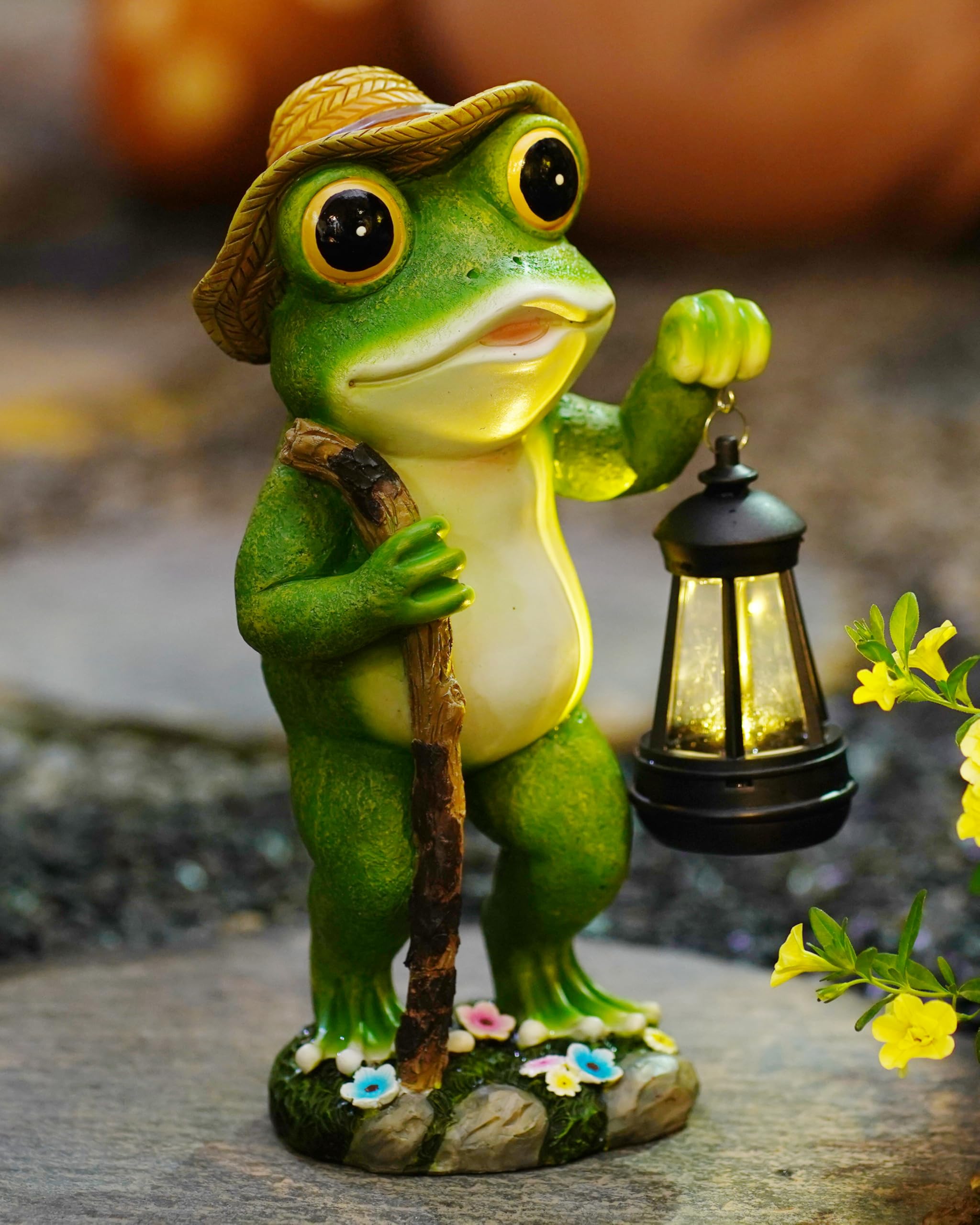 Twinbling Solar Frog garden lantern lighting a nighttime path