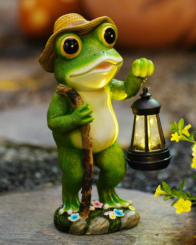 Twinbling Solar Frog garden lantern lighting a nighttime path