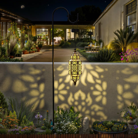 Twinkya Moroccan pattern projection lights cast intricate shadows on walls and paths.