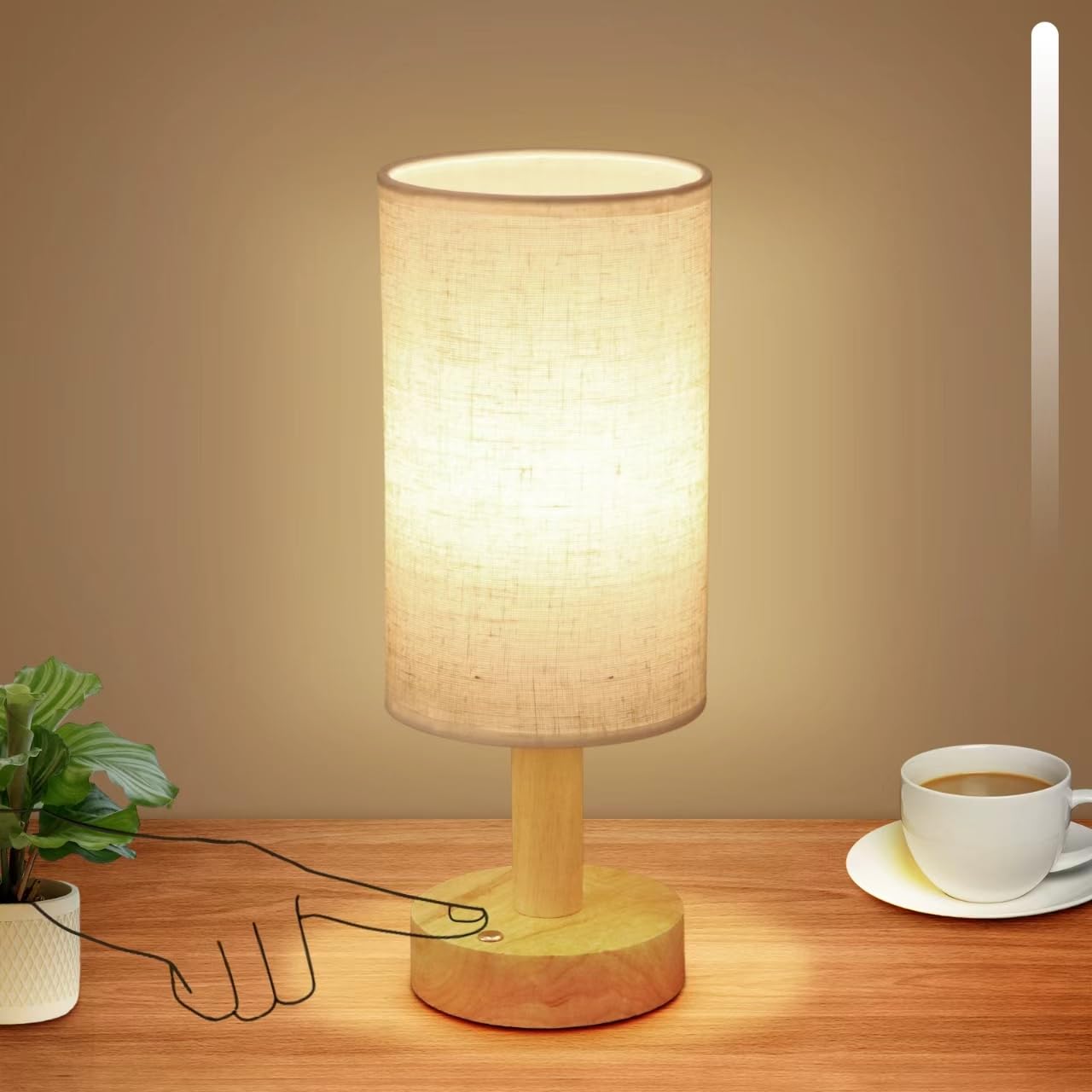 UCHENTON rechargeable cordless touch table lamp on a nightstand, offering portable warmth.
