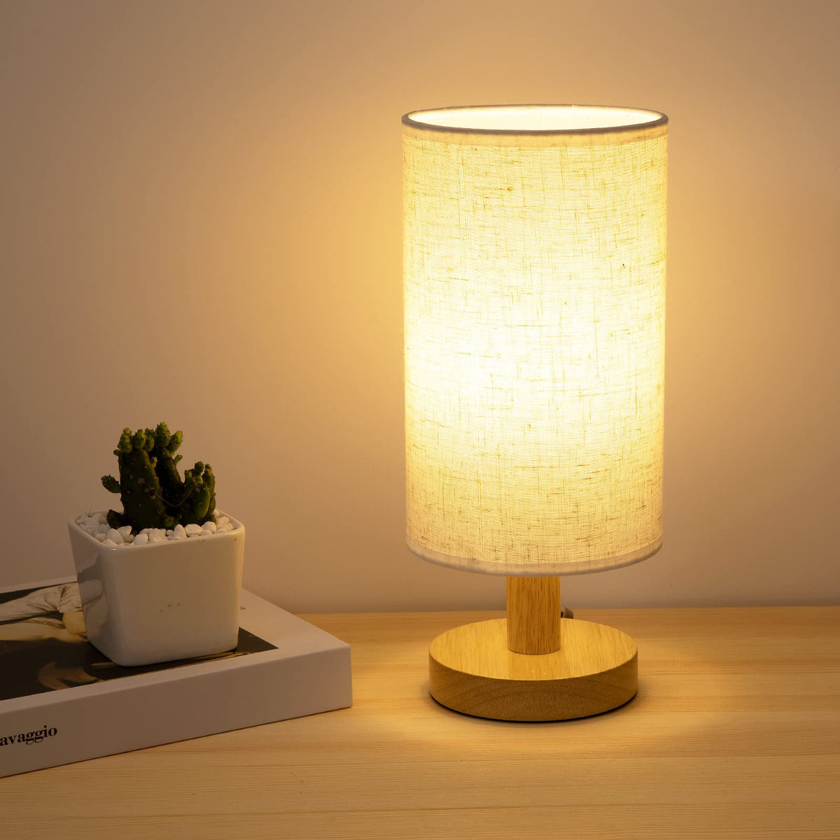 UCHENTON bedside lamp with wood base close-up highlighting sturdy construction for cozy lighting.