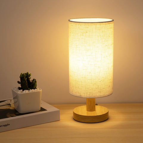 UCHENTON bedside lamp with wood base close-up highlighting sturdy construction for cozy lighting.