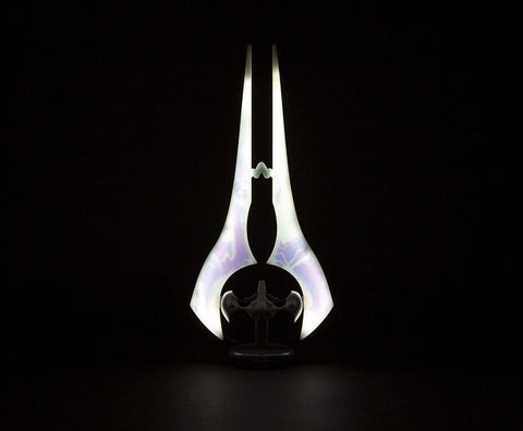 Ukonic Halo Energy Sword Covenant prop light enhances desk decor.