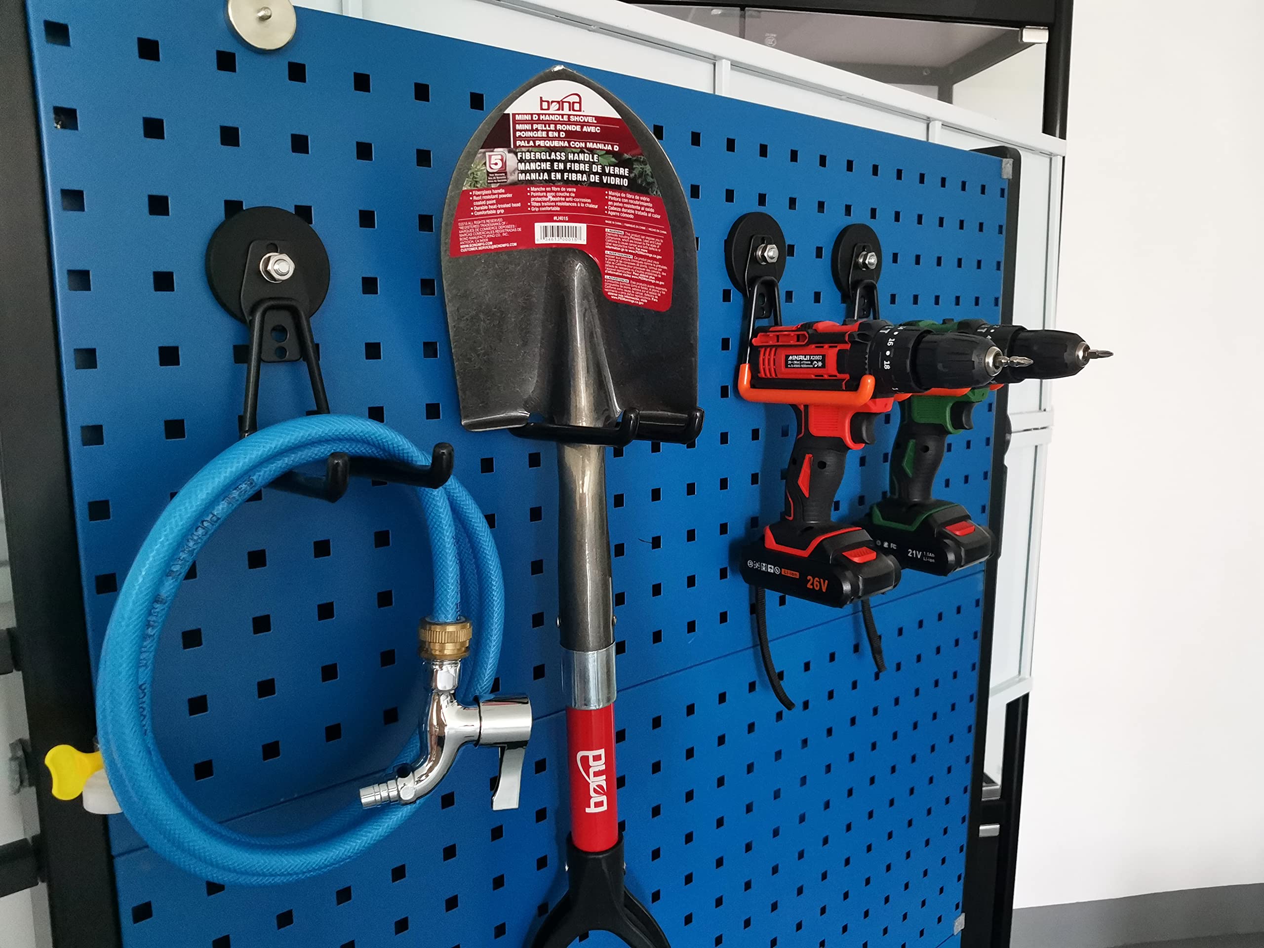 ULIBERMAGNET orange hooks add space-saving organization to workshops.