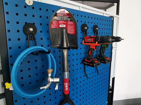 ULIBERMAGNET orange hooks add space-saving organization to workshops.