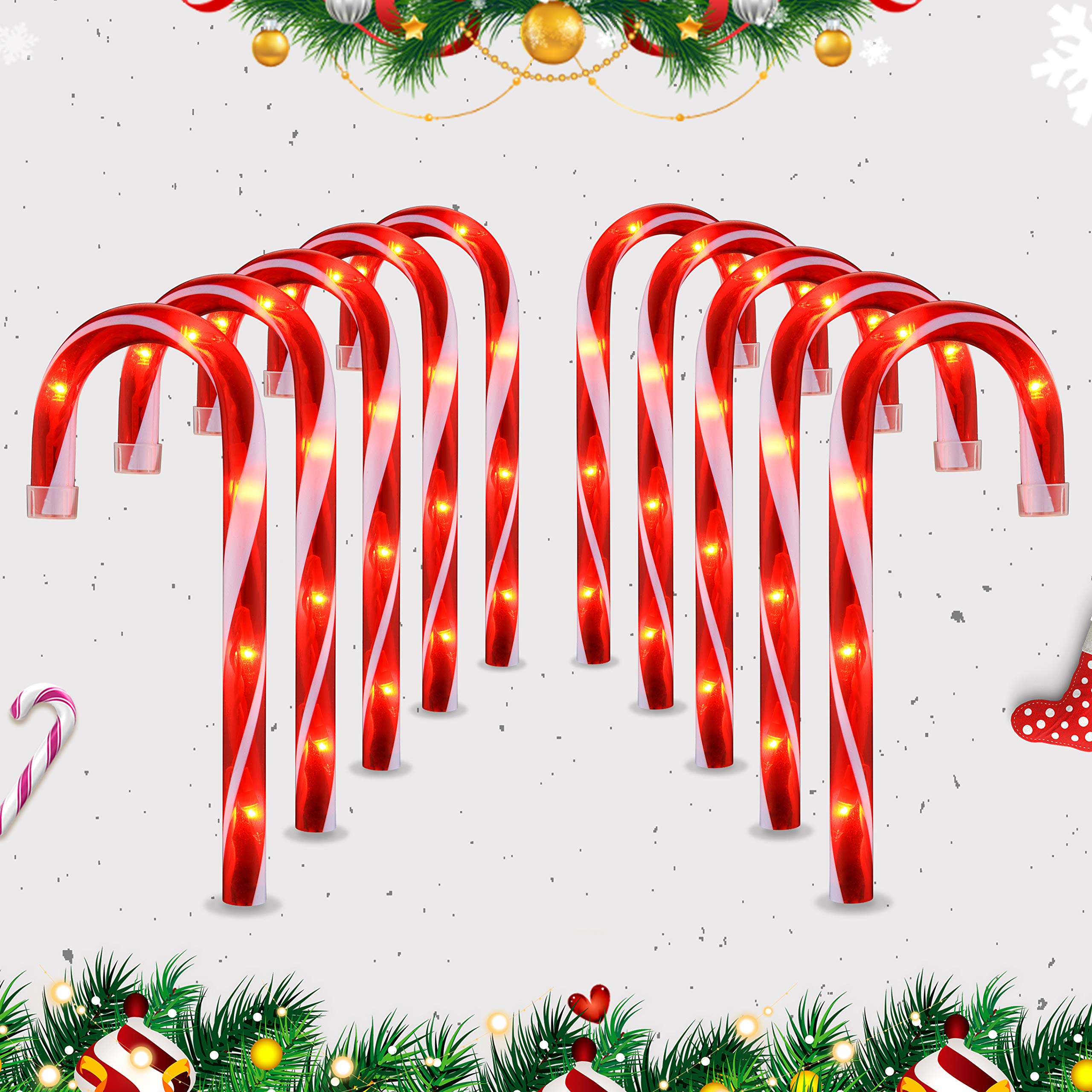 Ultimate Unicorn candy cane lights on stakes illuminate outdoor paths safely.
