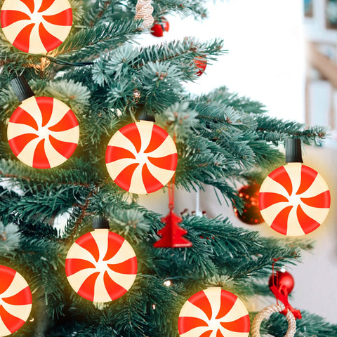 Red candy-light aesthetic creates festive energy without overpowering your outdoor space