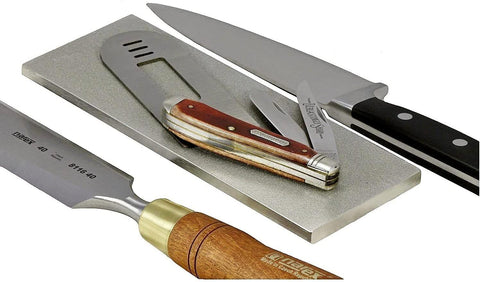 Ultrasharp 8x3 stone set in action with various knives for sharpening.