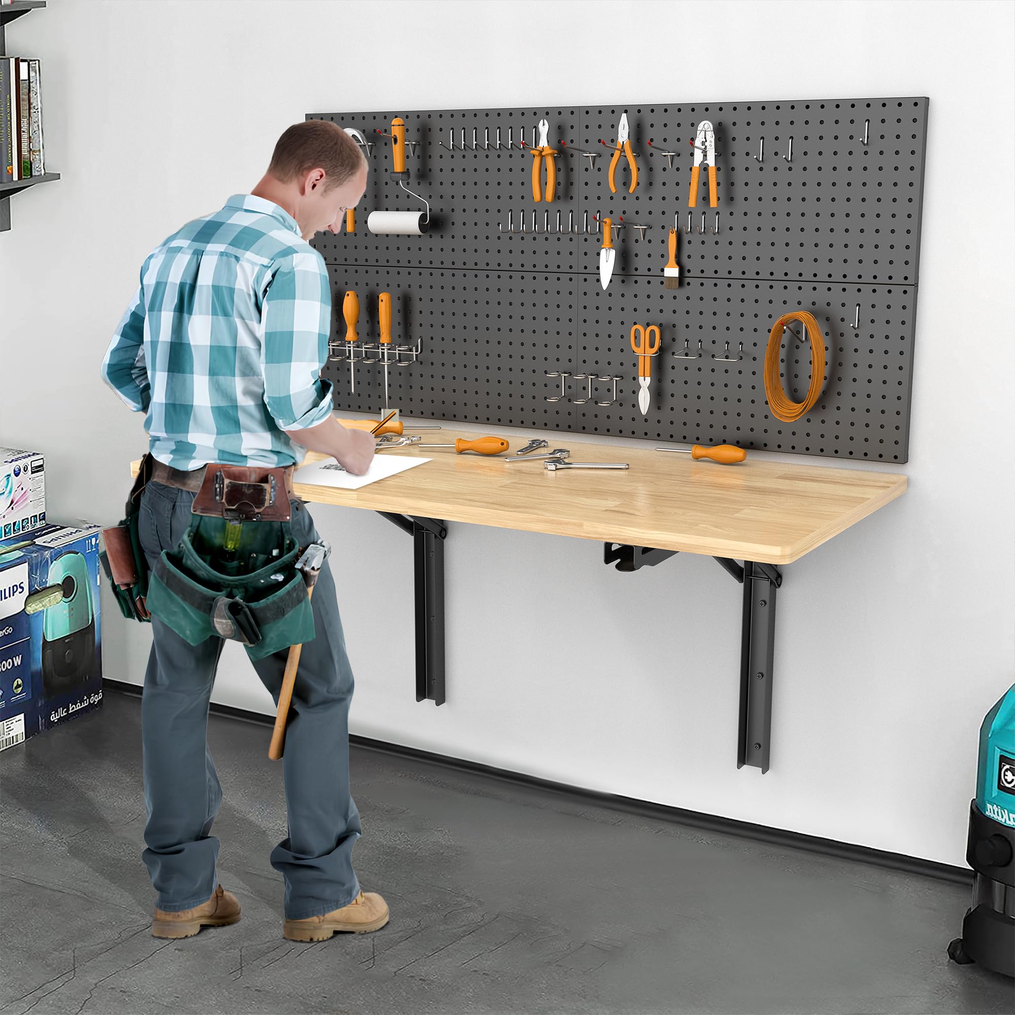 Ultrawall workspace setup with brackets in a garage for organized projects.
