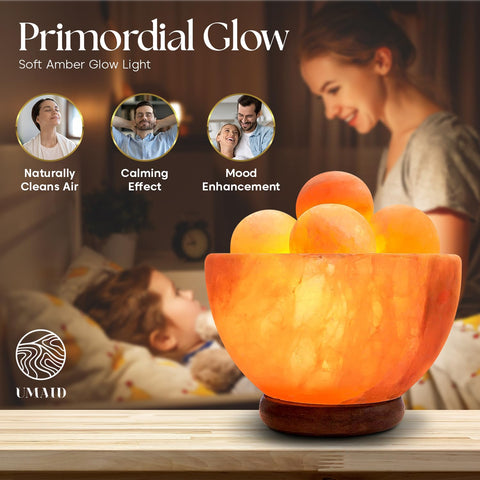 UMAID pink salt lamp adds natural glow to yoga and meditation spaces.