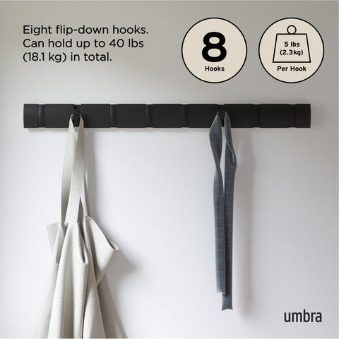Umbra Flip black finish highlights modern, space-saving design in small spaces.