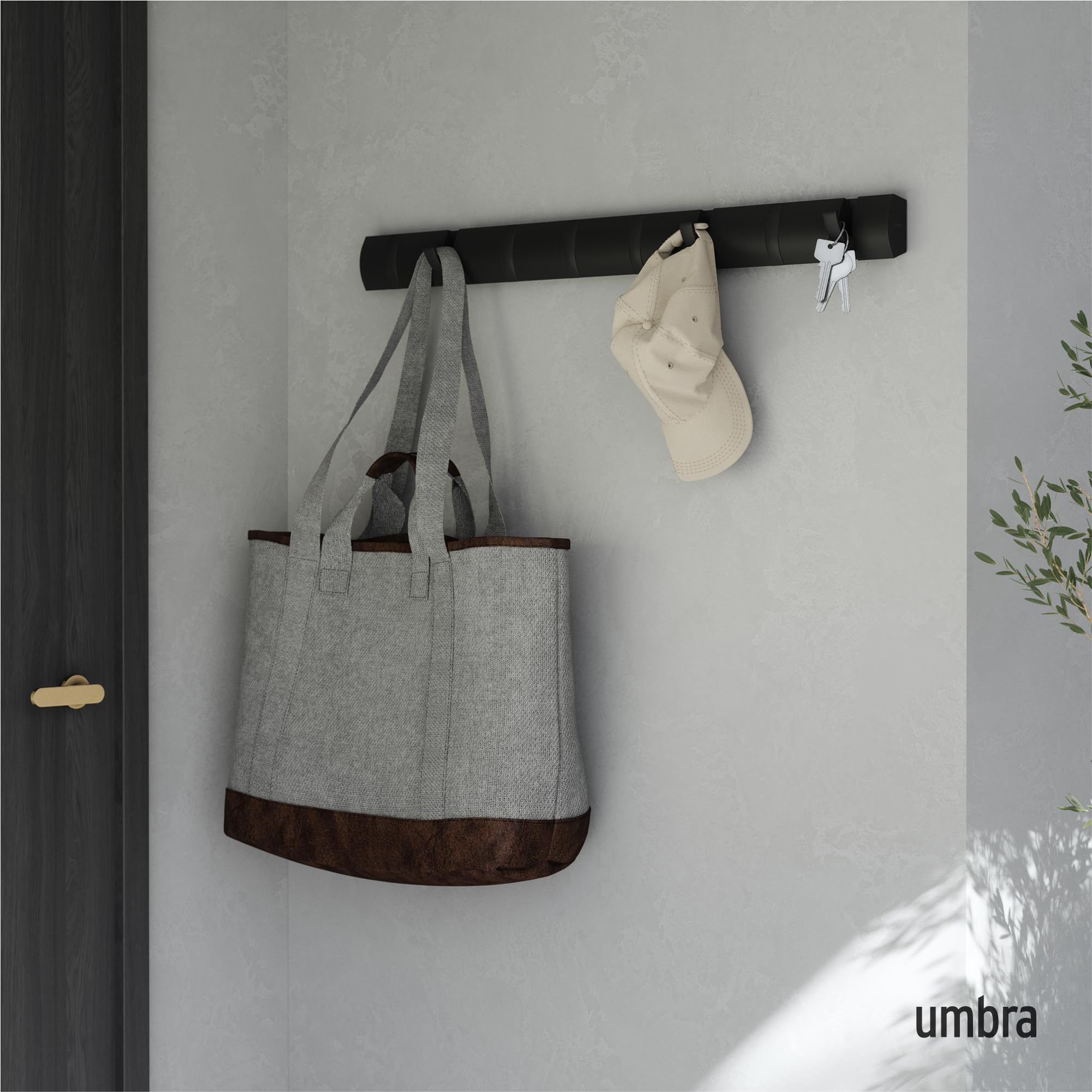 Umbra Flip retractable hooks close-up showing space-saving versatility.