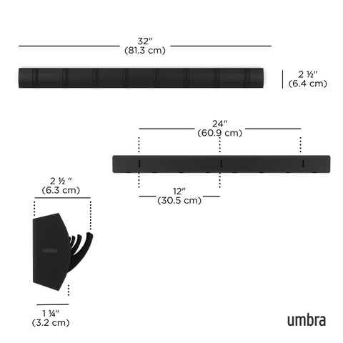 Umbra Flip wall-mounted coat rack in entryway organizes coats and bags.