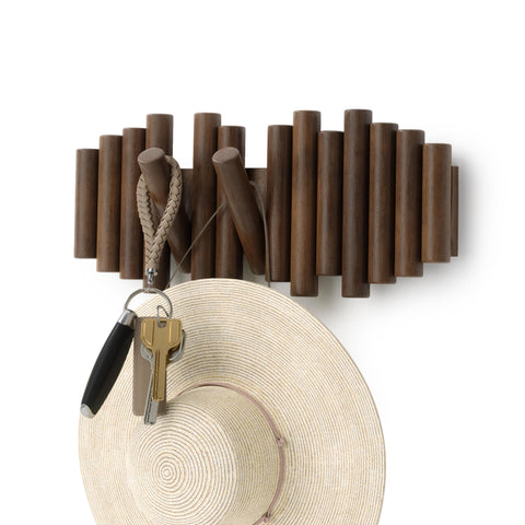 Umbra Picket wall hook with five flip-down pegs for versatile storage.