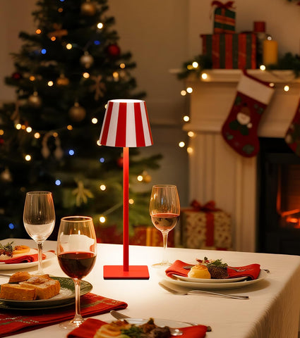 UME cordless table lamp in red lighting a cozy dining setup