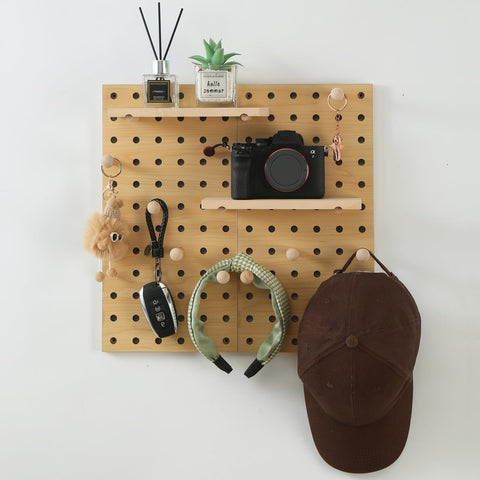 UMICAL beige wood pegboard wall hooks and shelf offers customizable display options.